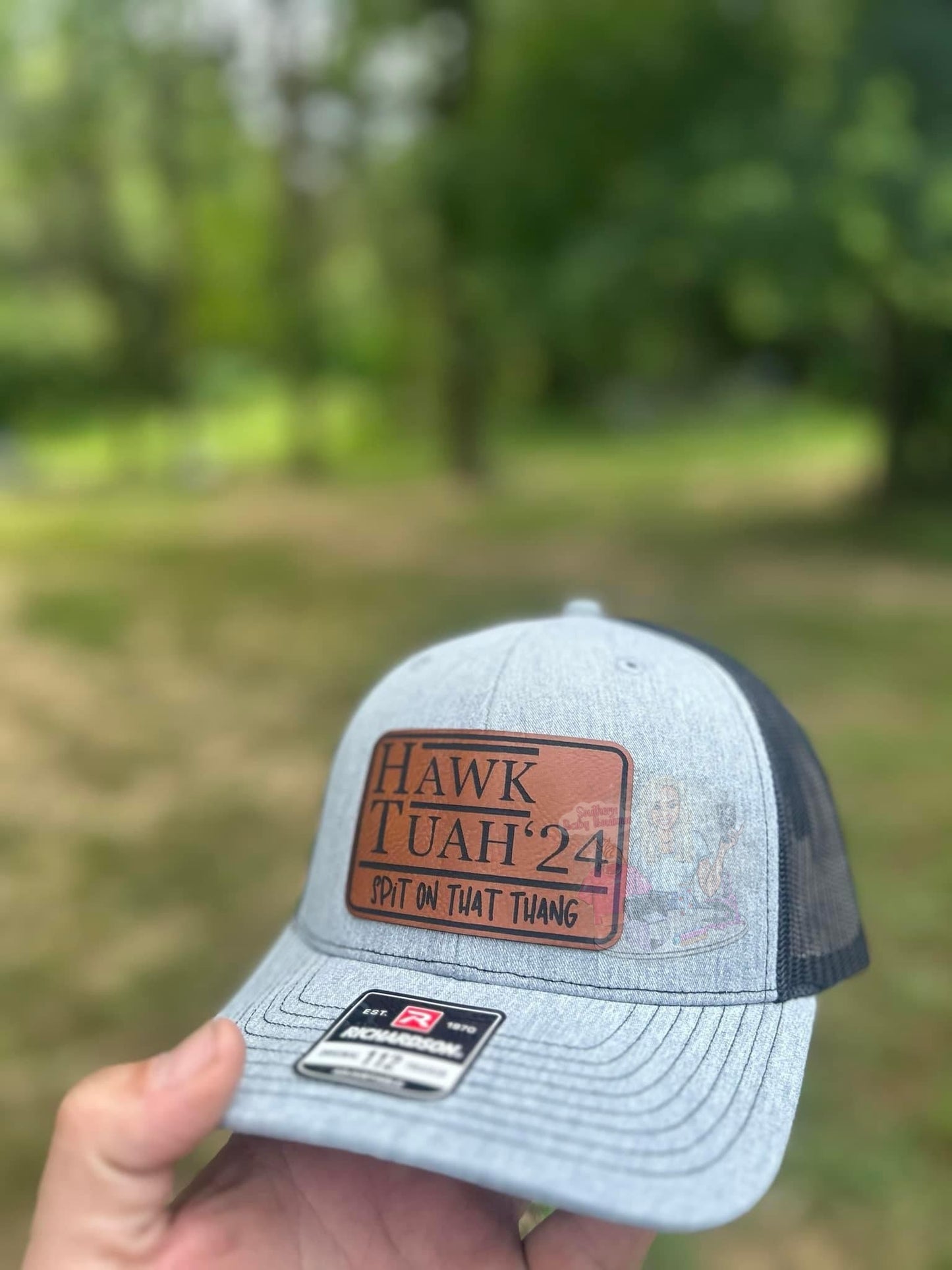 “Hawk Tuah hat”